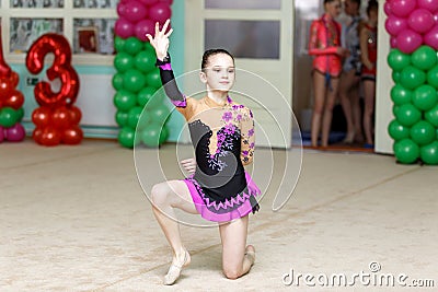 Cute girl on art gymnastics competitions Stock Photo