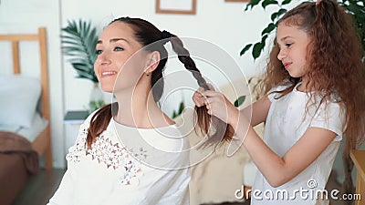Cute Girl Braids Her Mom Hair in Braid, Focus on Daughter, Slow Motion Stock Footage - Video of girl, hairstyle: 150228216 Cute Girl Braids Her Mom Hair in Braid, Focus on Daughter, Slow Motion Stock Footage - Video of girl, hairstyle: 150228216