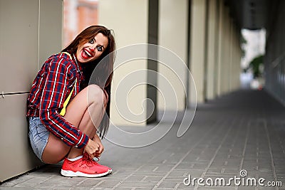 Cute girl in a clown makeup Stock Photo
