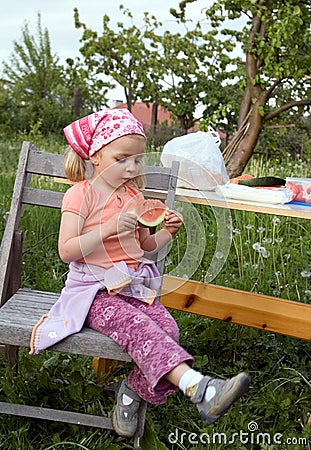Cute girl eating watermelon Stock Photo