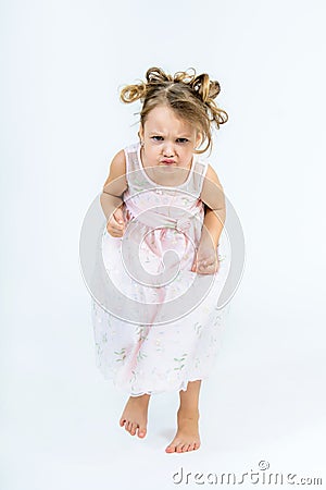 Cute girl with intense concentration of face running to the came Stock Photo