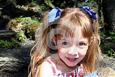 Cute girl with pigtails Stock Photo