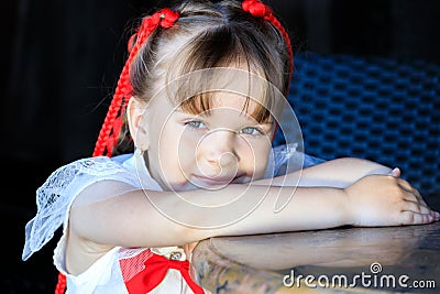 cute girl sitting at a table in kafe in the summer Stock Photo