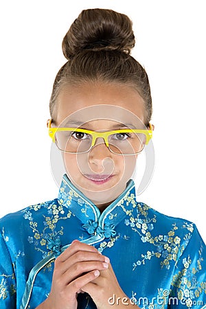 Cute girl wearing Chinese dress and yellow glasses Stock Photo