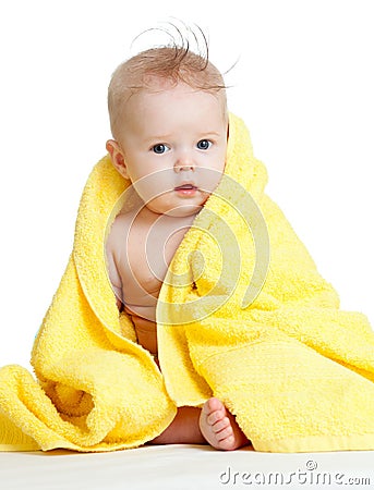 Cute happy blue-eyed baby in colorful towel Stock Photo