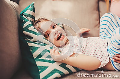 Cute happy toddler girl having fun at home Stock Photo