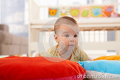 Cute infant on playmat Stock Photo