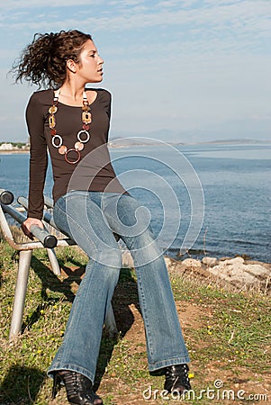 Cute lady in casual clothes on sea side Stock Photo