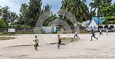 Cute little african boys on a street in Zanzibar Editorial Stock Photo
