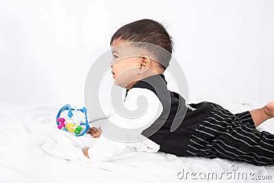 Little asian baby boy play toy Stock Photo