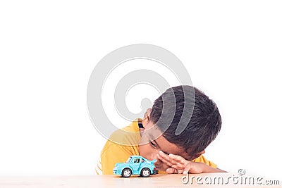 Cute little asian boy child kid preschooler playing car Stock Photo