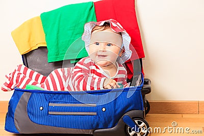Cute little baby girl enjoy packing, kids travel Stock Photo