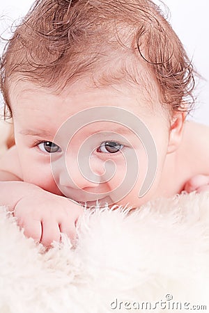 Cute little baby todler infant lying on blanket Stock Photo