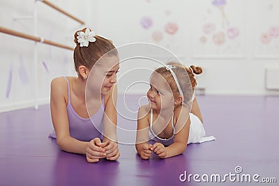 Charming two young ballerinas practicing at ballet class Stock Photo