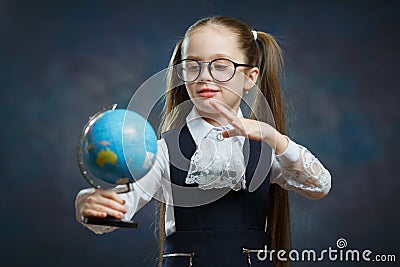Cute Little Blond Schoolgirl Hold World Globe Stock Photo