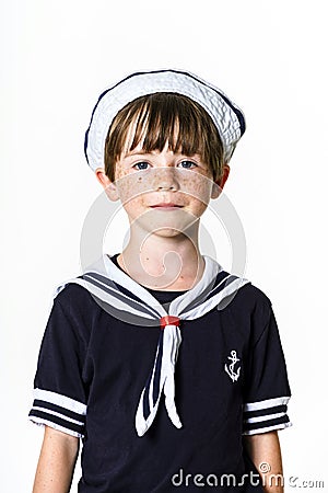 Cute little boy dressed in sailor suit Stock Photo