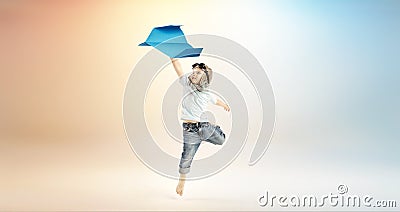 Cute little boy flying with the paper plane Stock Photo