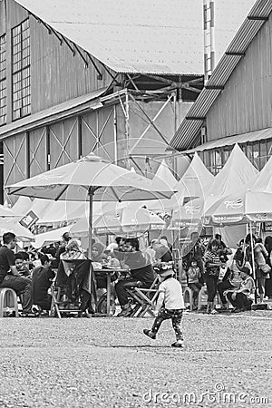 Cute little boy follow walk alone, Bandung Air Show 2017 Editorial Stock Photo