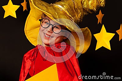 Cute little boy in glasses and sky watcher costume Stock Photo