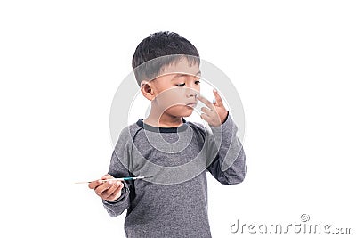 Cute little boy play painting on nose Stock Photo