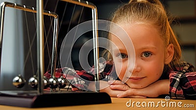 Cute little child toddler beautiful young restful school girl sit on psychotherapy session indoors pretty blonde kid Stock Photo