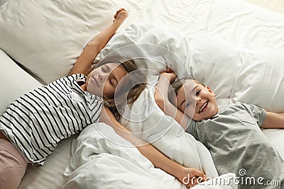 Cute little children on bed. Healthy sleep Stock Photo