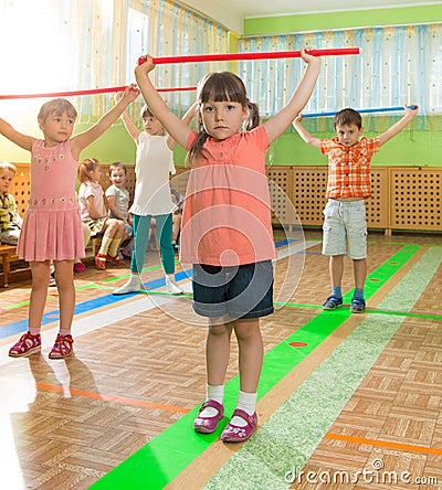 Cute little children at daycare gym Stock Photo