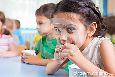 Cute little children drinking milk Stock Photo