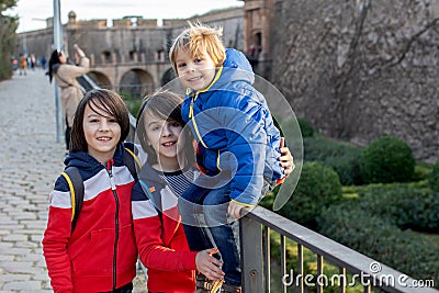 Cute little children tourists admiring Barcelona city, family travel with kids Stock Photo