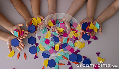 Cute little childrens hands working with toys at preschool class Stock Photo