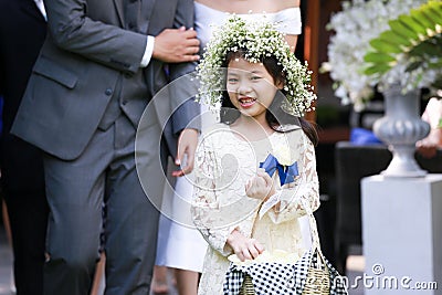 Cute little flower girl Stock Photo