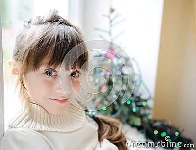 Cute little girl in anticipation of the holiday Stock Photo