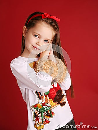 Cute little girl in Christmas wear Stock Photo