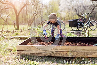 Cute little girl enjoy gardening Stock Photo