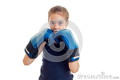 Cute little girl holding a near person hands in boxing gloves is isolated on a white background Stock Photo