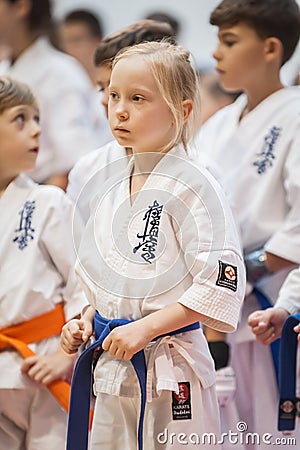 Cute little girl in kimono on Martial Arts Sport Demonstration Editorial Stock Photo