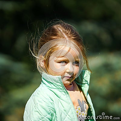 Cute little girl outdoor portrait Stock Photo