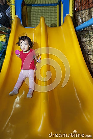 Cute little girl on playground Stock Photo