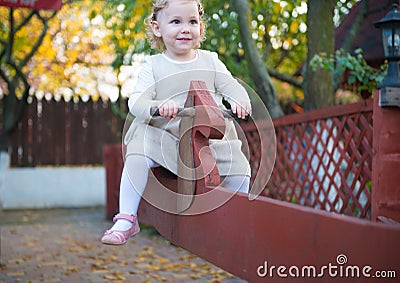 Cute little girl at playground Stock Photo