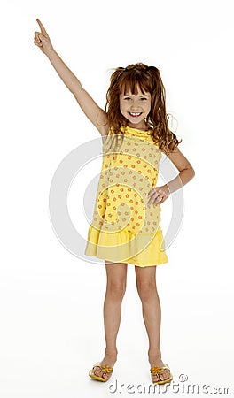 Cute Little Girl Pointing Upward Stock Photo