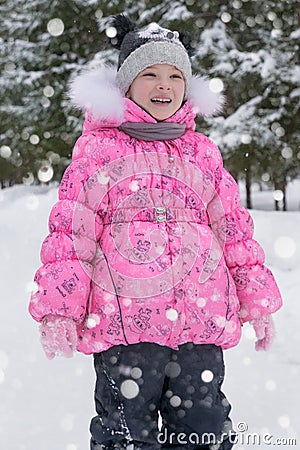 Cute little girl in winter wood Stock Photo