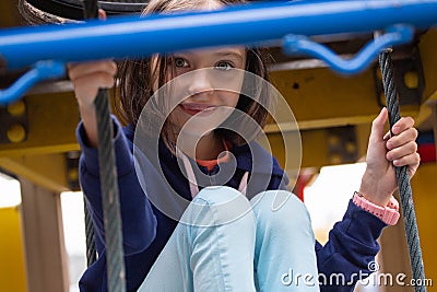 Little girl without teeth on the playground Stock Photo