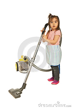 Cute little housewife cleaning house Stock Photo