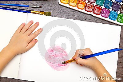 Cute little preschooler child drawing at home Stock Photo