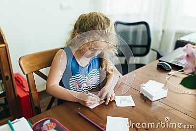 Cute little preschooler child drawing at home Stock Photo