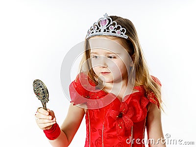 Cute little princess dressed in red isolated on white background Stock Photo