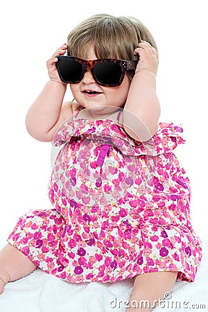 Cute little toddler wearing classy shades Stock Photo