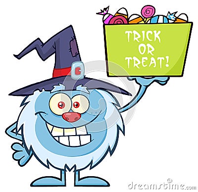 Cute Little Yeti Character With Witch Hat Holding Up A Trick Or Treat Halloween Candy Basket Stock Photo