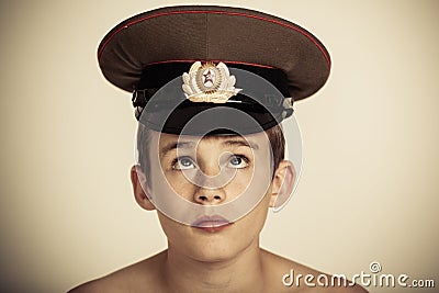Cute male child in officer hat Stock Photo