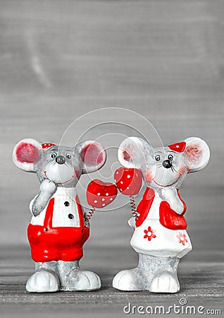 Cute mice with red hearts. Love Valentines Day decoration Stock Photo